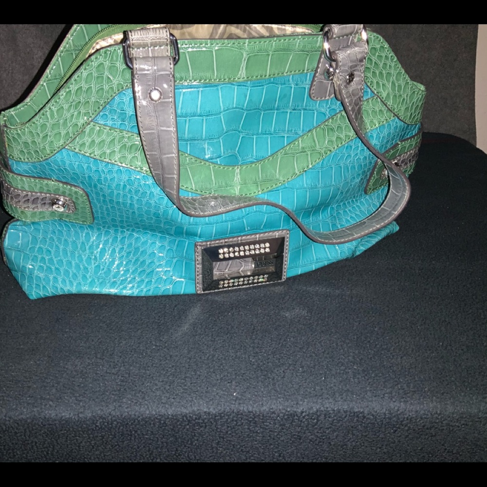Brand new turquoise leather handbag